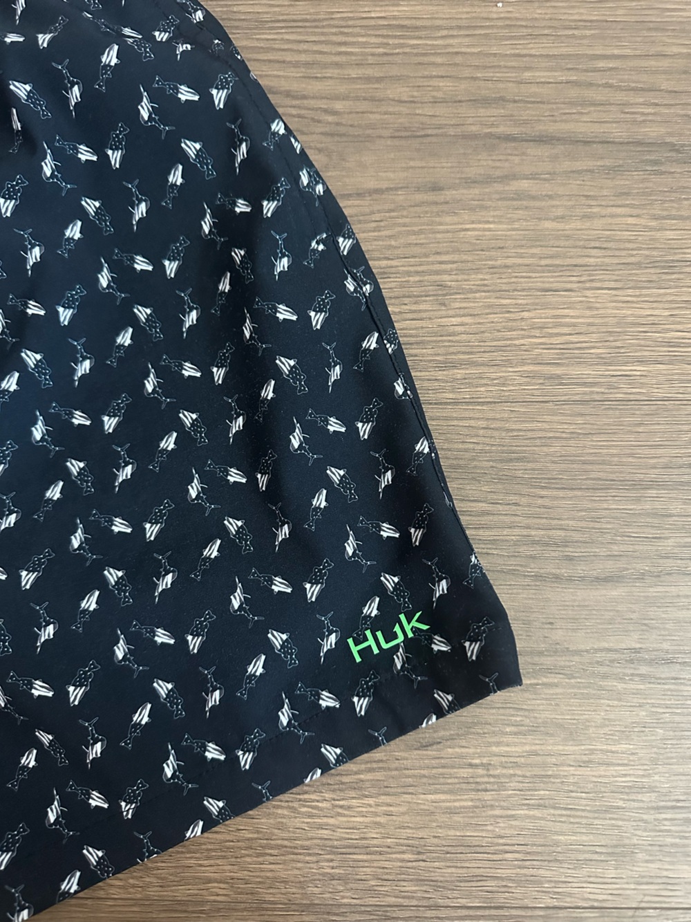 Huk Men’s Black Swim Shorts with White Fish Print and Green Logo